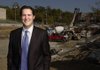 FILE — Brandon Barber of The Barber Group poses near one of his Fayetteville deveolopments.