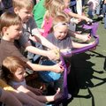  Children make short work of a ribbon cutting ceremony Saturday for the grand opening of Gilmore Par...