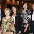  Northwest Arkansas Children’s Shelter board President Scott Tassani, from left, is joined by fellow...