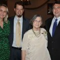  Women’s History Month honoree Bonnie Cook, second from right, is joined by sons Don Cook, from righ...