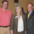  Bentonville Mayor Bob McCaslin, from right, Marty Lehman and Chris Sooter show support for the Nort...