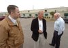 Clarksville Mayor Billy Helms (right) and Matt Wylie (left) talk with Sid Kern of Greenville Tube Co. in March. Helms has named Wylie head of a committee to look for new ways to attract companies to the city.