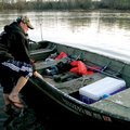 Intong Sivixay of Rogers launches his boat Sunday at the Dr. Don Roufa/U.S. 412 access on Beaver Lak...