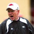 Arkansas Coach Bobby Petrino yells during practice Tuesday at practice inside Razorback Stadium.