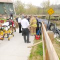 Firefighters and police from Bentonville and Bella Vista transport two Kansas women to a hospital af...