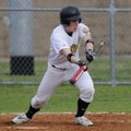 Prairie Grove’s Zack Schrock attempts a bunt during Monday’s game against Shiloh Christian in Prairi...