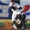 NATURALS 5, MISSIONS 1 - Northwest Arkansas’ Chris McConnell throws to first to complete a double pl...