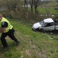ARKANSAS 16 ACCIDENT - Fayetteville police Cpl. Rich Duncan climbs an embankment Thursday after exam...