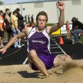 WAR EAGLE RELAYS - Fayetteville’s Stephen Soerens splashes into the sand pit while competing in the ...
