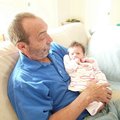 Harry Harmon cuddles his granddaughter, Kate Harmon Hanney, in this undated photo. The Rogers pediat...