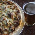 Beat This Meat, which combines marinara, meatballs, pepperoni, Italian sausage, bacon, ham, mozzarel...