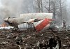 Wreckage of the Polish presidential plane smolders Saturday near Smolensk in western Russia in this image taken from Polish television. Many called the crash Poland’s worst disaster since World War II.