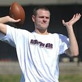 Arkansas quarterback Ryan Mallett tosses a pass during the first day of spring practice March 30.