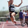  Bentonville sophomore Brittani Reagan leaps while competing in the long jump Friday in the John McD...