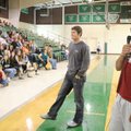  University of Arkansas quarterback Tyler Wilson, center, and tight end D.J. Williams, right, speak ...