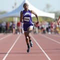 Fayetteville sophomore Sydney Conley, center, nears the finish line to come in second in the 100-met...