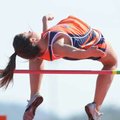  Rogers Heritage’s Brittany McClain clears the bar during the high jump competition in the John McDo...