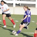 Fayetteville junior Casey O'Brien passes the ball upfield against Springdale Friday at Jarrell Willi...