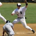  Bentonville’s Logan Pearson waits for the throw from catcher Blake Baxendale while attempting to pi...