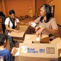  Life Harvester Church members Lequita Means of Springdale, right, Nedra Brown, center, and friend A...