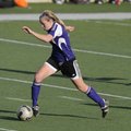  Fayetteville junior Anne Mitchell sprints upfield against Springdale High on Friday in Jarrell Will...