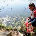  George Edgmon walks a rugged trail Saturday at Lake Fayetteville, joining dozens of other volunteer...