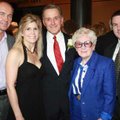  Eagle Award recipient Carl Collier, center, is joined by Brant and Meredith Dowse, from left, Virgi...