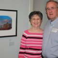 Photographer Richard and Anne Wells stand next to his photograph "Suite View of the Past" at Crystal...