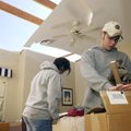  MICHAEL ZAMORA �� THE MORNING NEWS
James Brownell, 15, packs up a box of his belongings Monday, Mar...
