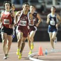  Springdale High junior Gabe Gonzalez leads the field on his way to a win in the 3,200 meters in a t...