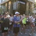 Runners applaud during the opening ceremonies of the Hogeye Marathon in Fayetteville on Sunday morni...