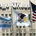 Flags wave along Michigan Ave. Bridge outside the Chicago Tribune Tower. Lenders said Monday they ar...