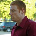 Gary William Dunn is escorted Monday into the Johnson County Courthouse in Clarksville for jury sele...