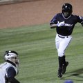 Northwest Arkansas’ Derrick Robinson runs toward home plate as Corpus Christi’s Brian Esposito waits...