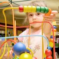 LIBRARY LEARNING - Kiera Brown, 3, moves pieces through a puzzle in the Bogle Children’s Library in ...