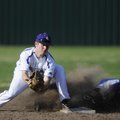 Rogers High’s Jason Carmichael safely slides into second base as Fayetteville’s Ryan Dunn receives t...