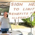 Jan Lea from Secure Arkansas seeks signers Tuesday to a petition to limit benefits to illegal immigr...