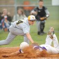  Prairie Grove pitcher Jalen Beeks, left, reaches to apply the tag as Elkins’ Chad Curry scores a ru...