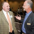  Marek Kiewra, left, from Poland, talks with Full Gospel Evangelistic Association president Curt Bez...