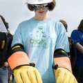  Leah Tripp, an eighth-grader from Central Junior High in Springdale, tries to unscrew a nut from a ...