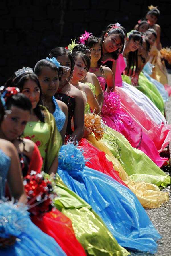 Fifteen Year old Girls Pose For Pictures During Quinceanera 