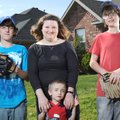Jennifer Kelley, center, of Springdale received assistance from Pagnozzi Charities to help outfit he...