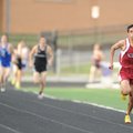 Springdale High junior Gabe Gonzalez runs during the Bulldog Relays April 1 at Harmon Field in Fayet...
