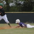 Elkins’ Hunter Guffey slides in to second base ahead of the throw to Greenland’s Ryan Duchanois on M...
