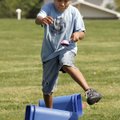 Jesus Naranjo, 11, from Northside Elementary School in Decatur, avoids obstacles as he carries a wat...