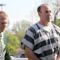 Randall Greenway, right, is escorted Tuesday by Benton County Sheriff’s Office Sgt. Chris Sparks int...