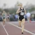 Bentonville’s Kelsey Wheelhouse heads for the finish line and takes second place in the 800-meter ru...