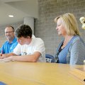 Rogers High’s Slade Hames signs to play golf for Arkansas Tech University on Tuesday in the school’s...