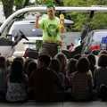 Jason Quail, the “Ecogeeco,” talks about alternative fuels and biofuels to second-graders Friday at ...