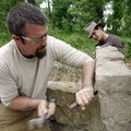  Jason Palmer (left) and Chad Ladish, both of Fayetteville, chisel Arkansas native stone for a stone...